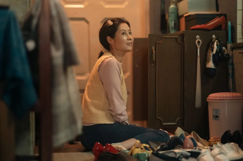 Ae-sun and Gwan-sik amid the Jeju landscape